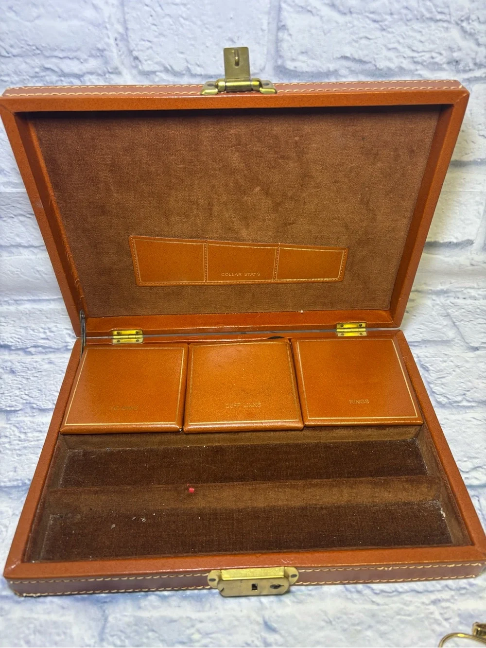 Mid century jewelry box with all the jewelry seen in pictures. Cuff links, tie
